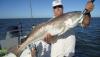 Gary and 34 lbs redfish.JPG